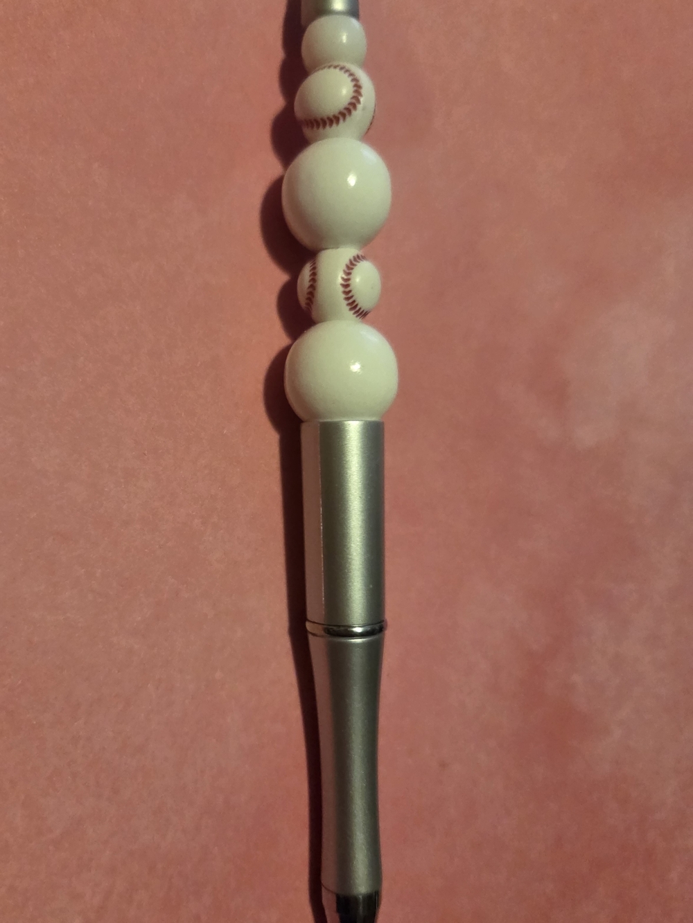 Silver and White Beaded Pen with Baseball Stitch Detail